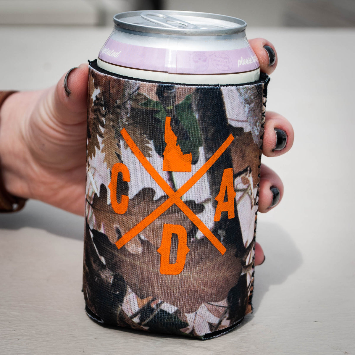 http://cdaidaho.com/cdn/shop/products/idaho-antler-camo-coozie-2_1200x1200.jpg?v=1606458417