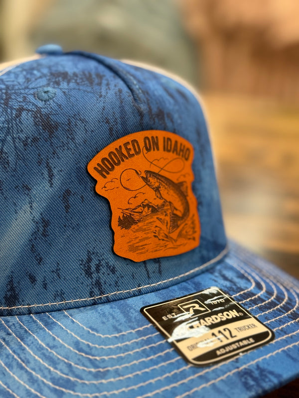 Hooked On Idaho Leather Patch Trucker Hat