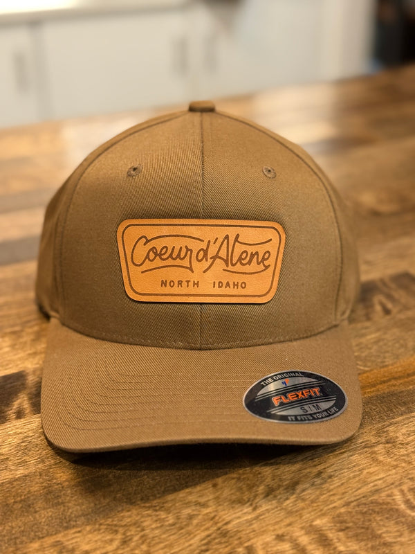 Classy Coeur d’Alene Leather Patch Flexfit Hat (Brown)