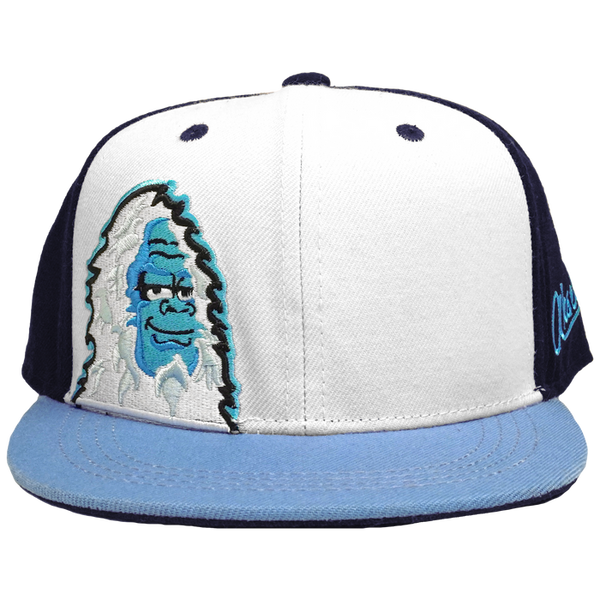 Aksels Wild Yeti kids flatbill snapback hat in white and navy with light blue bill