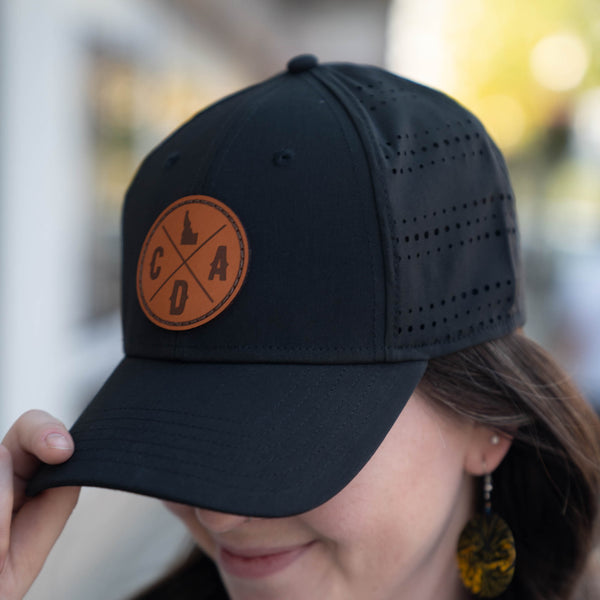 Black Perf Hat with Dark Leather Logo Patch