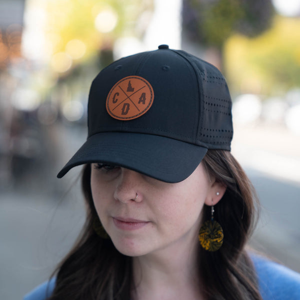 Black Perf Hat with Dark Leather Logo Patch