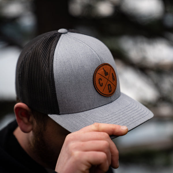 CDA Dark Leather Logo Heather Gray Trucker Hat