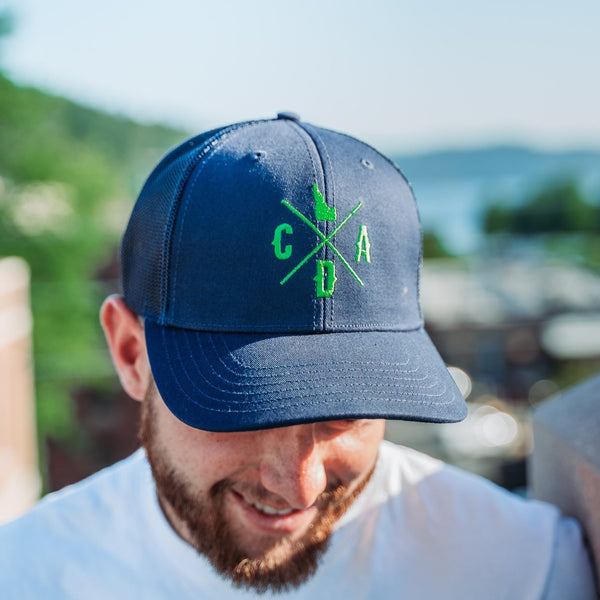 Green CDA IDAHO Logo Navy Trucker Hat