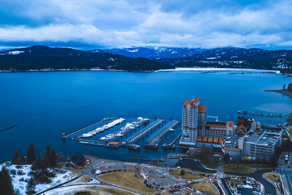 Vibrant Blue CDA Resort From The Air Postcard